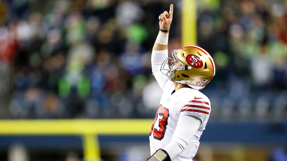 SEATTLE, WASHINGTON - DECEMBER 15: Brock Purdy #13 of the San Francisco 49ers celebrates after a touchdown against the Seattle Seahawks during the third quarter of the game at Lumen Field on December 15, 2022 in Seattle, Washington. Steph Chambers/Getty Images/AFP (Photo by Steph Chambers / GETTY IMAGES NORTH AMERICA / Getty Images via AFP)