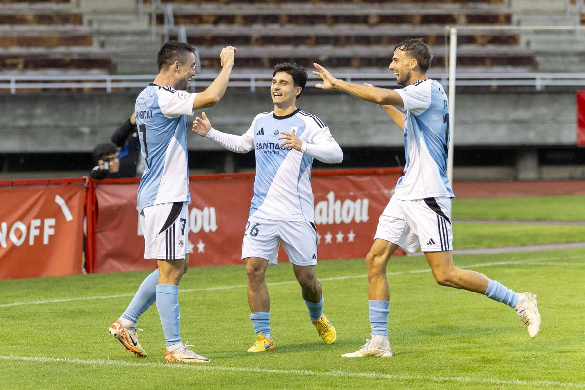 Goris celebra junto a Armental y Parapar.