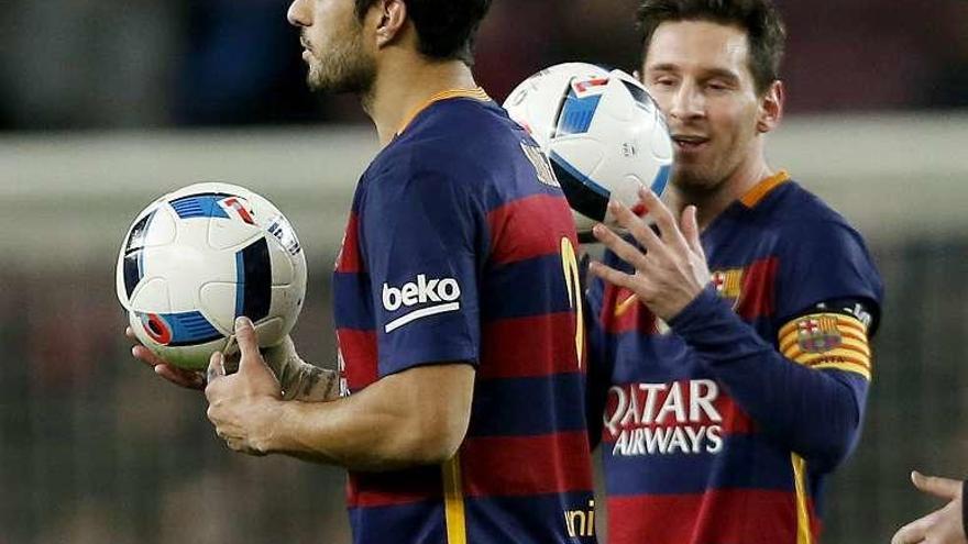 Messi y Luis Suárez, tras el 7-0 al Valencia en la Copa.