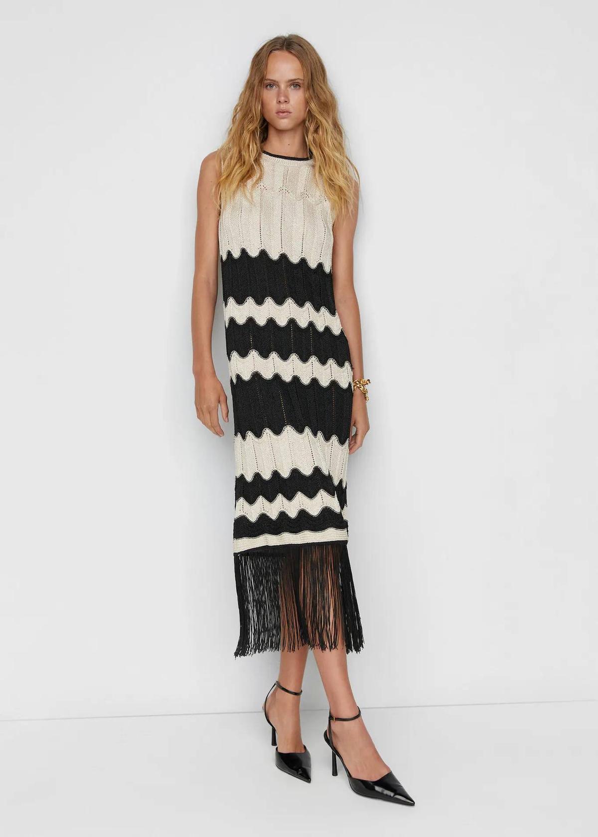 Vestido flecos bajo
