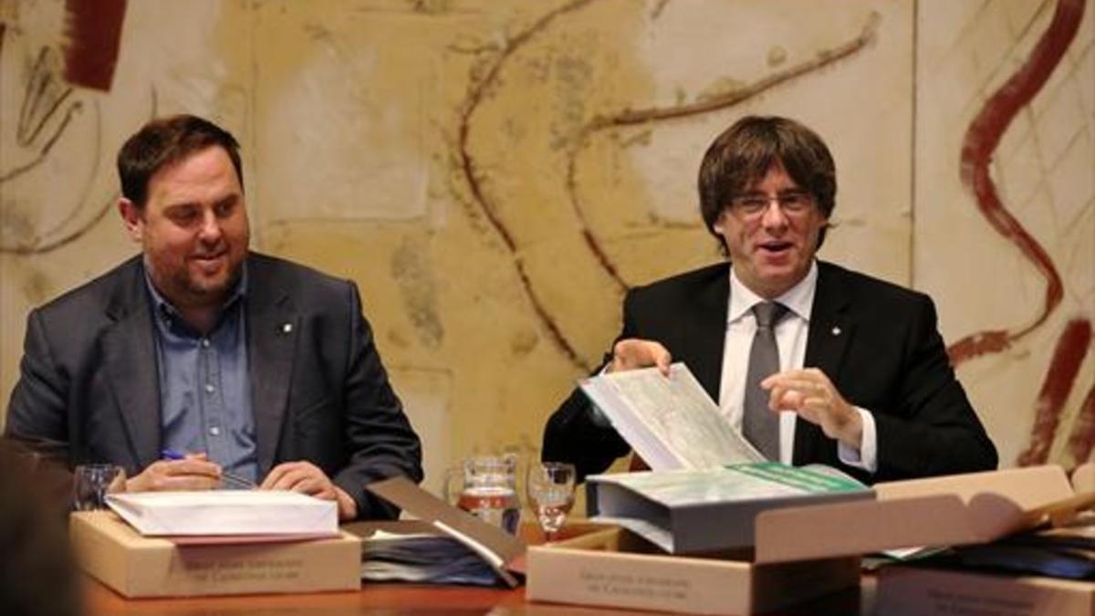 El vicepresidente Oriol Junqueras y el jefe del Govern, Carles Puigdemont.
