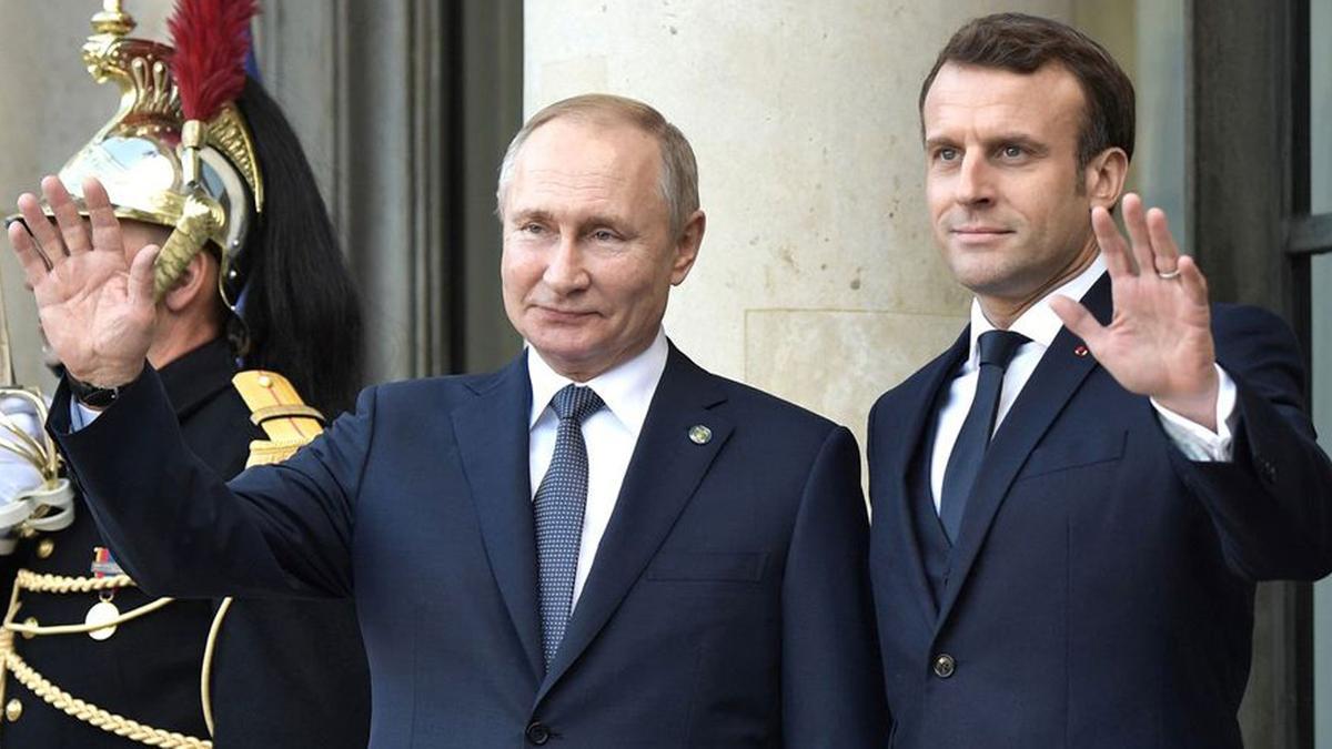Vladímir Putin y Emmanuel Macron.