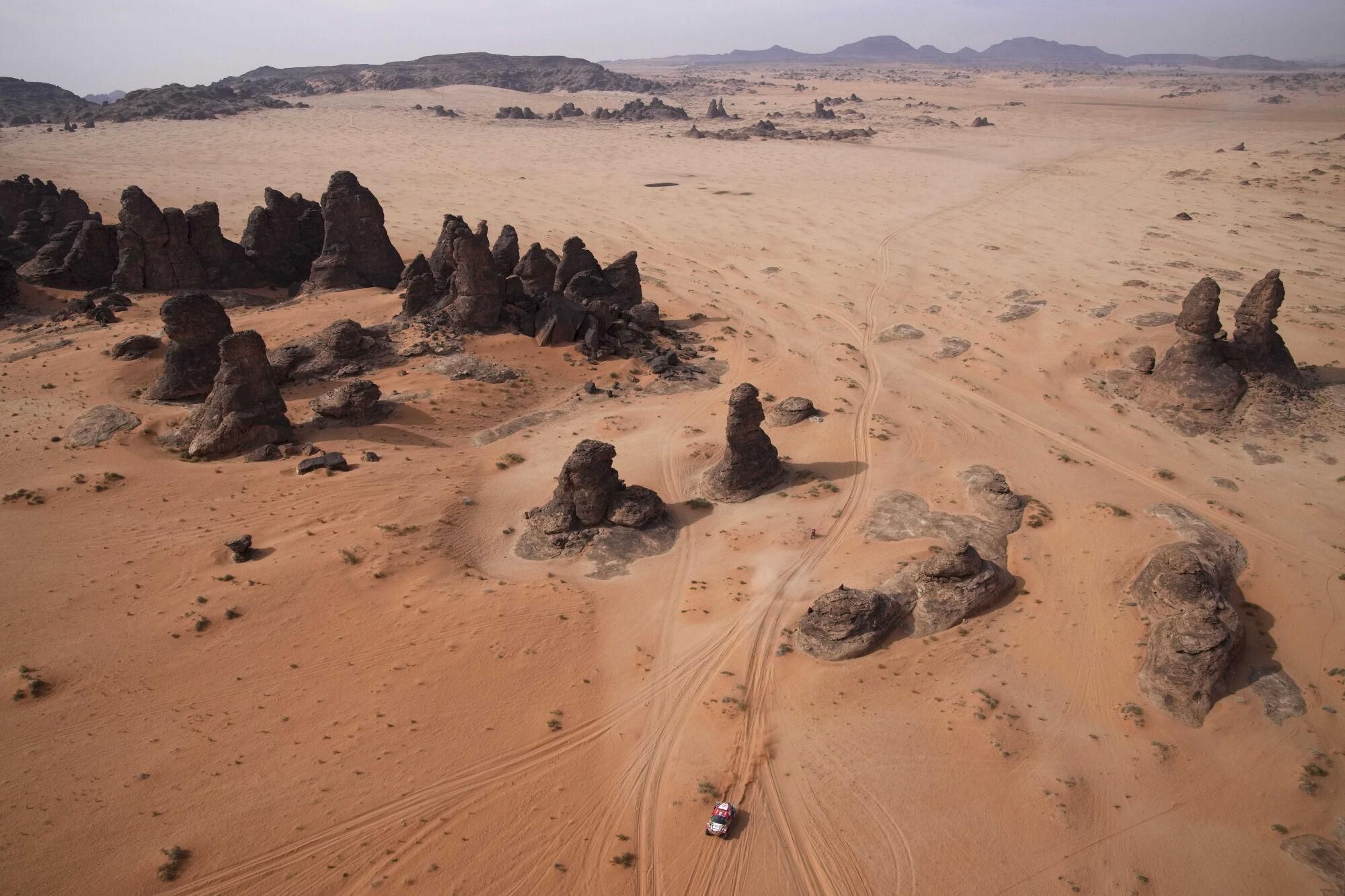 Driver Martin Prokop and co-driver Viktor Chytka, both of the Czech Republic, race their Ford during the fifth stage of the Dakar Rally between Alula and Hail, Saudi Arabia, Thursday, Jan. 9, 2025. (AP Photo/Christophe Ena). EDITORIAL USE ONLY / ONLY ITALY AND SPAIN