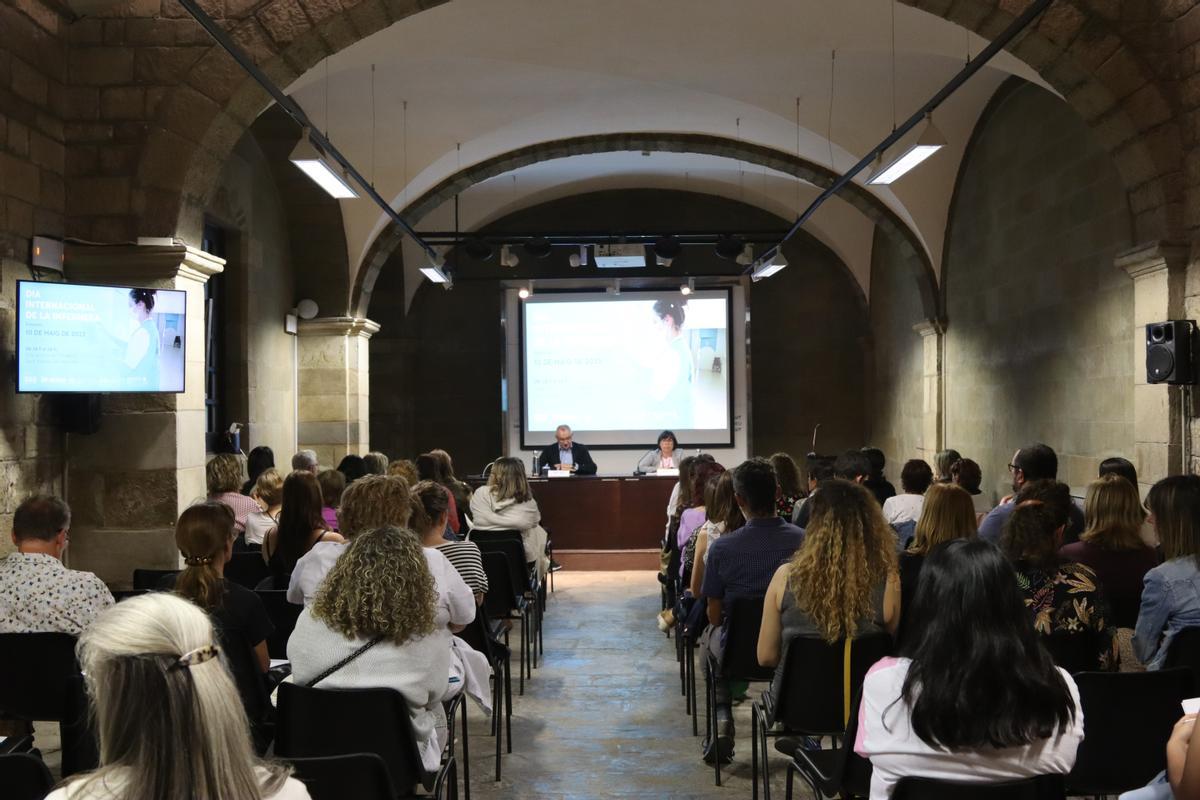 Manel Valls i Sílvia Graella a la inauguració de la jornada a la sala gòtica de Sant Andreu