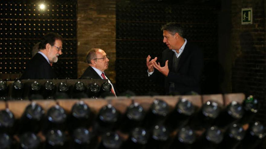 Abucheos a Rajoy en su visita a Freixenet