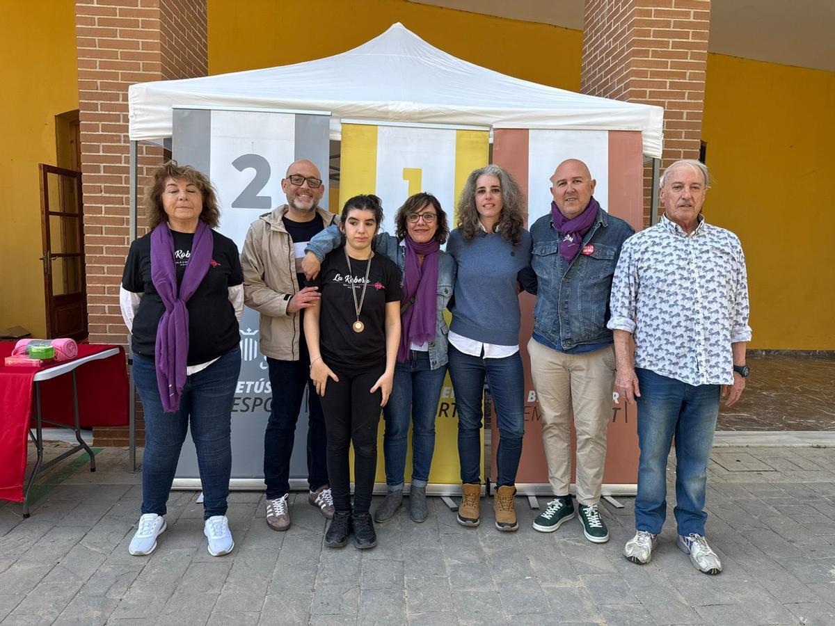 La entrega de una de las medallas.