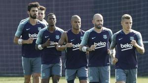 André Gomes, Munir, Marlon, Rafinha, Aleix Vidal y Digne, en el entrenamiento del lunes.