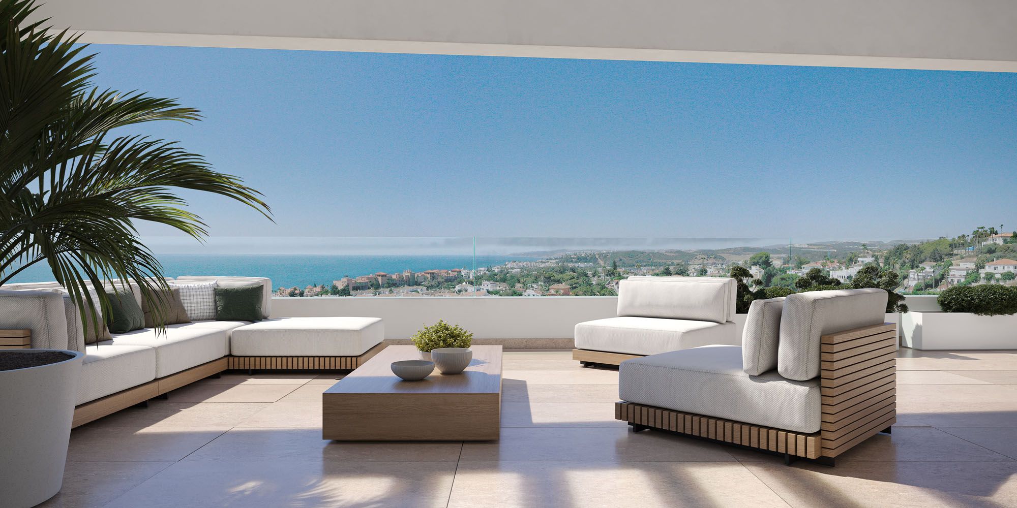 Terraza con el mar al fondo de una futura vivienda de la promoción Zenity Blau de AEDAS Homes en Estepona.