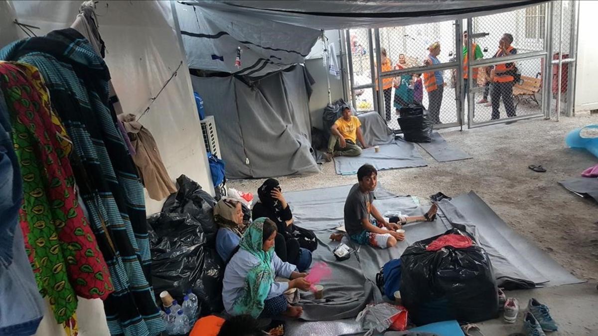 Refugiados en el asentamiento de Lesbos, en Grecia.