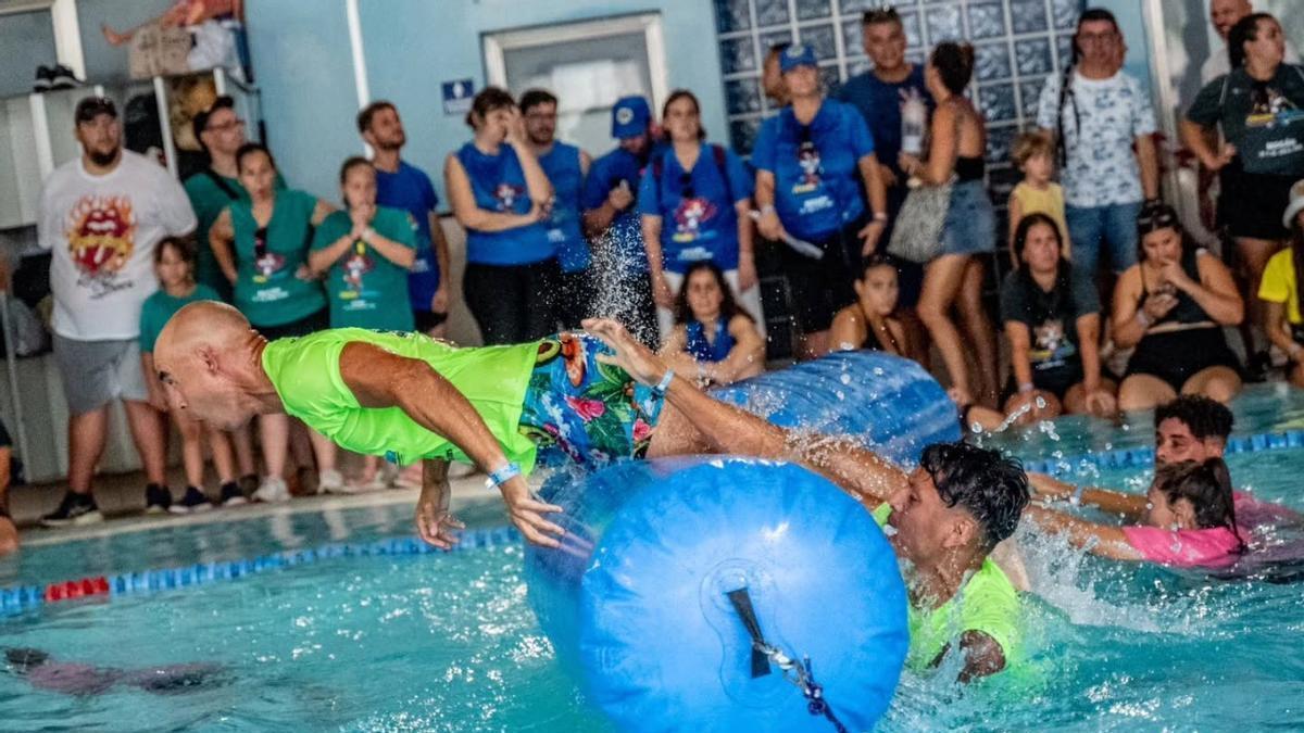 Imagen de varios competidores participando en una de las pruebas de Los Juegos de Verano.