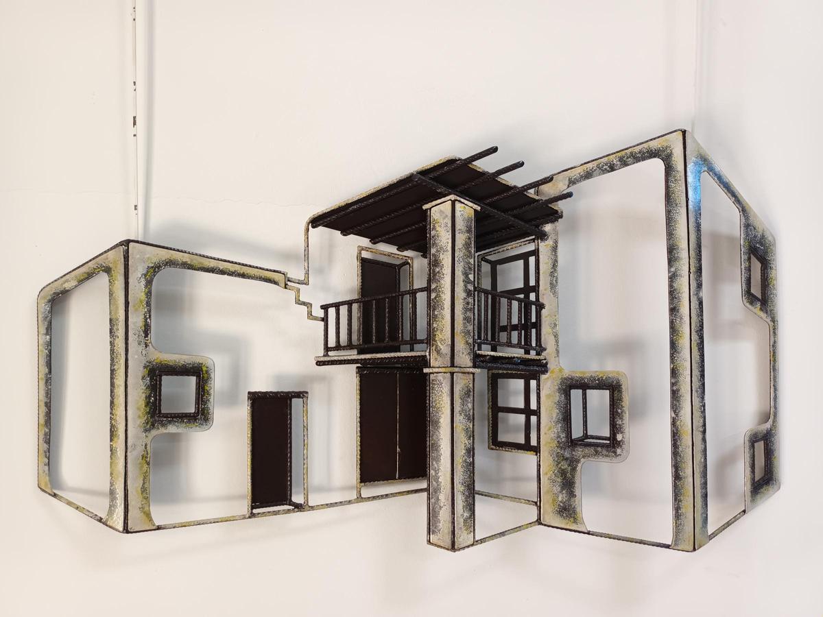Escultura de una casa payesa