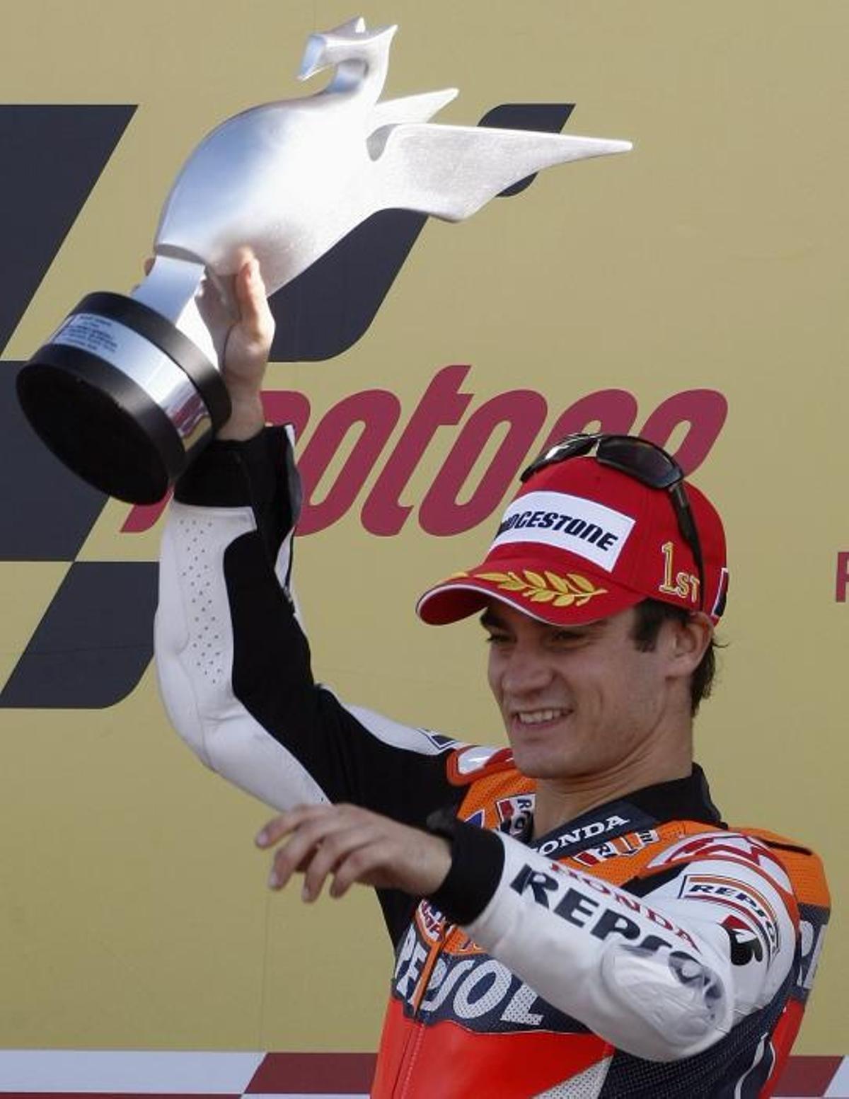 Honda MotoGP rider Pedrosa celebrates winning at ... Honda MotoGP rider Pedrosa celebrates winning at ...