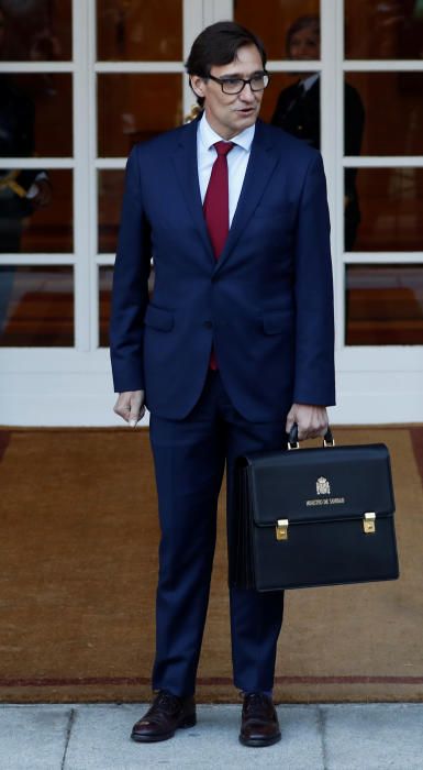 Spain's Prime Minister Pedro Sanchez holds his ...