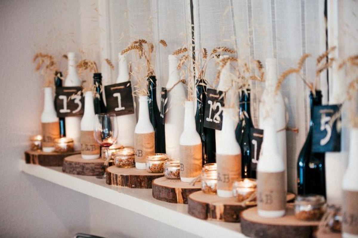 Ilumina tu boda: Velas decorando los centros de mesa