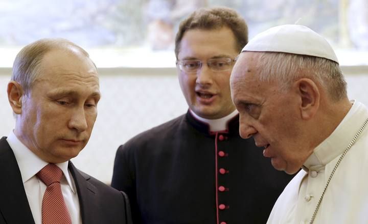 Russian President Putin meets Pope Francis during a private meeting at Vatican City