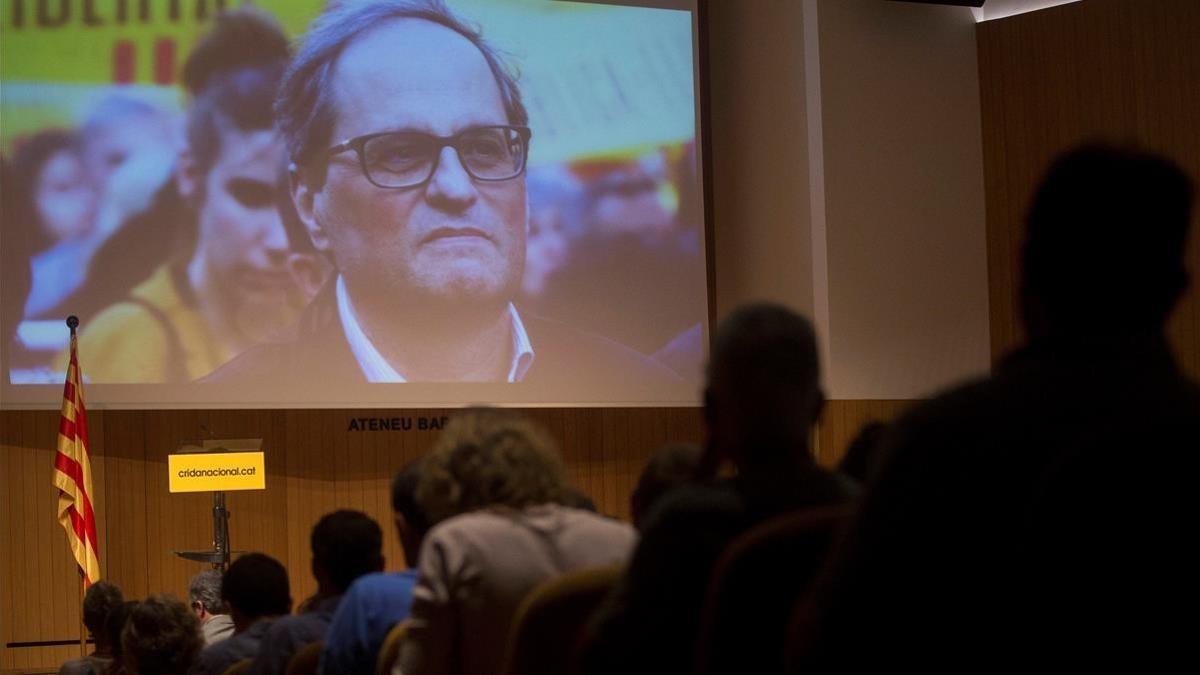 La presentación en Barcelona de Crida Nacional per la República, con Quim Torra, desde Alemania, en la pantalla.