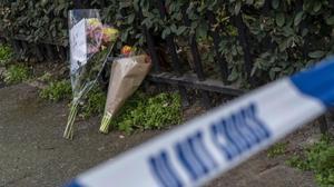 zentauroepp47257373 bouquets of flowers lie at the scene of the fatal stabbing o190307180334