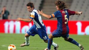 Tamudo y Puyol, durante el partido de ida en Montjuïc de la Supercopa en agosto de 2006. 