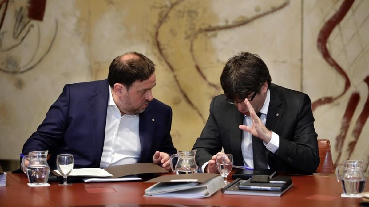 Carles Puigdemont y Oriol Junqueras