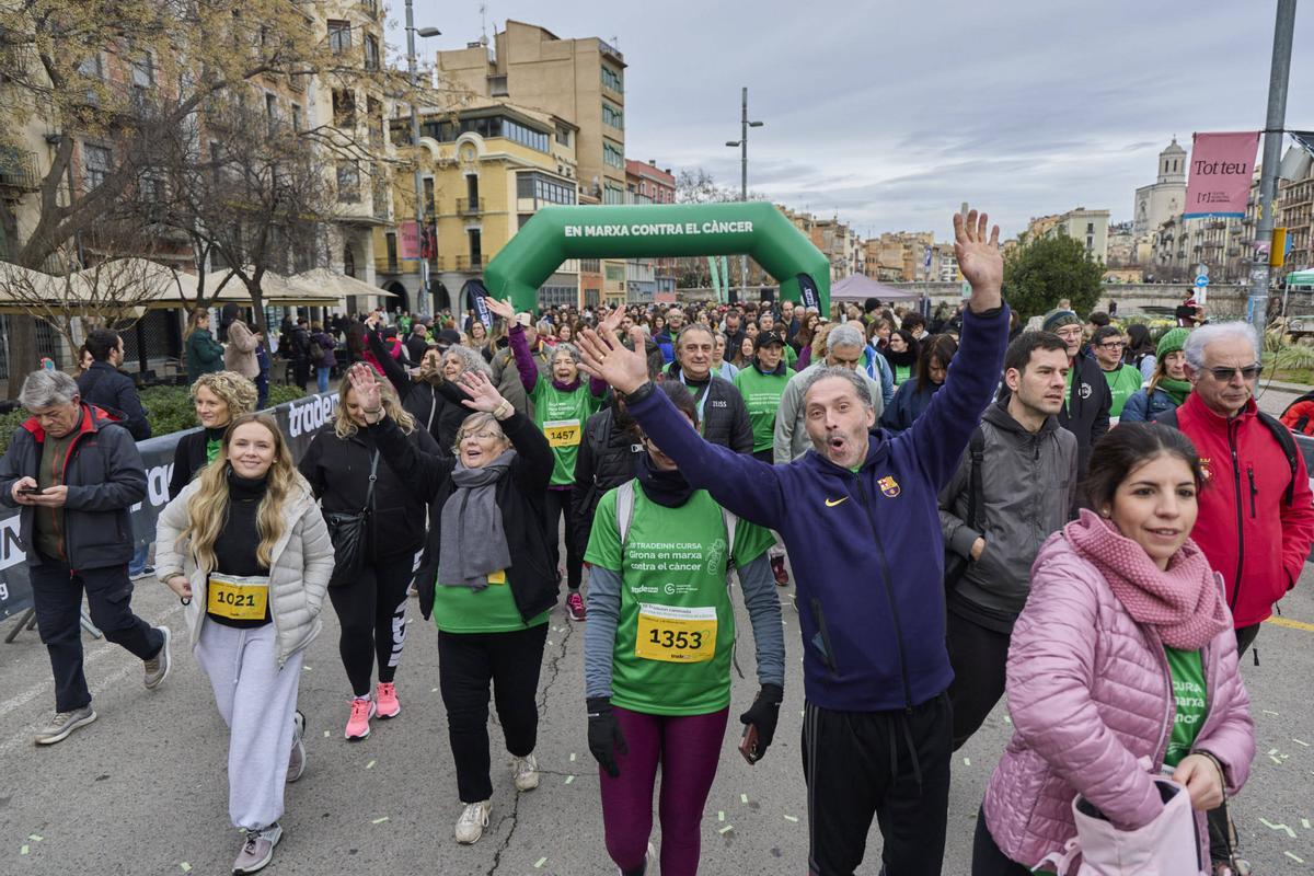 La XII Tradeinn Cursa Girona en Marxa Contra el Càncer en imatges