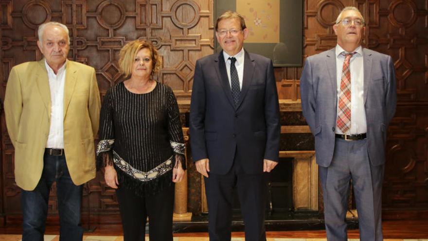 Ximo Puig junto a los representantes de la UNDEF en la reunión de ayer en la Generalitat.