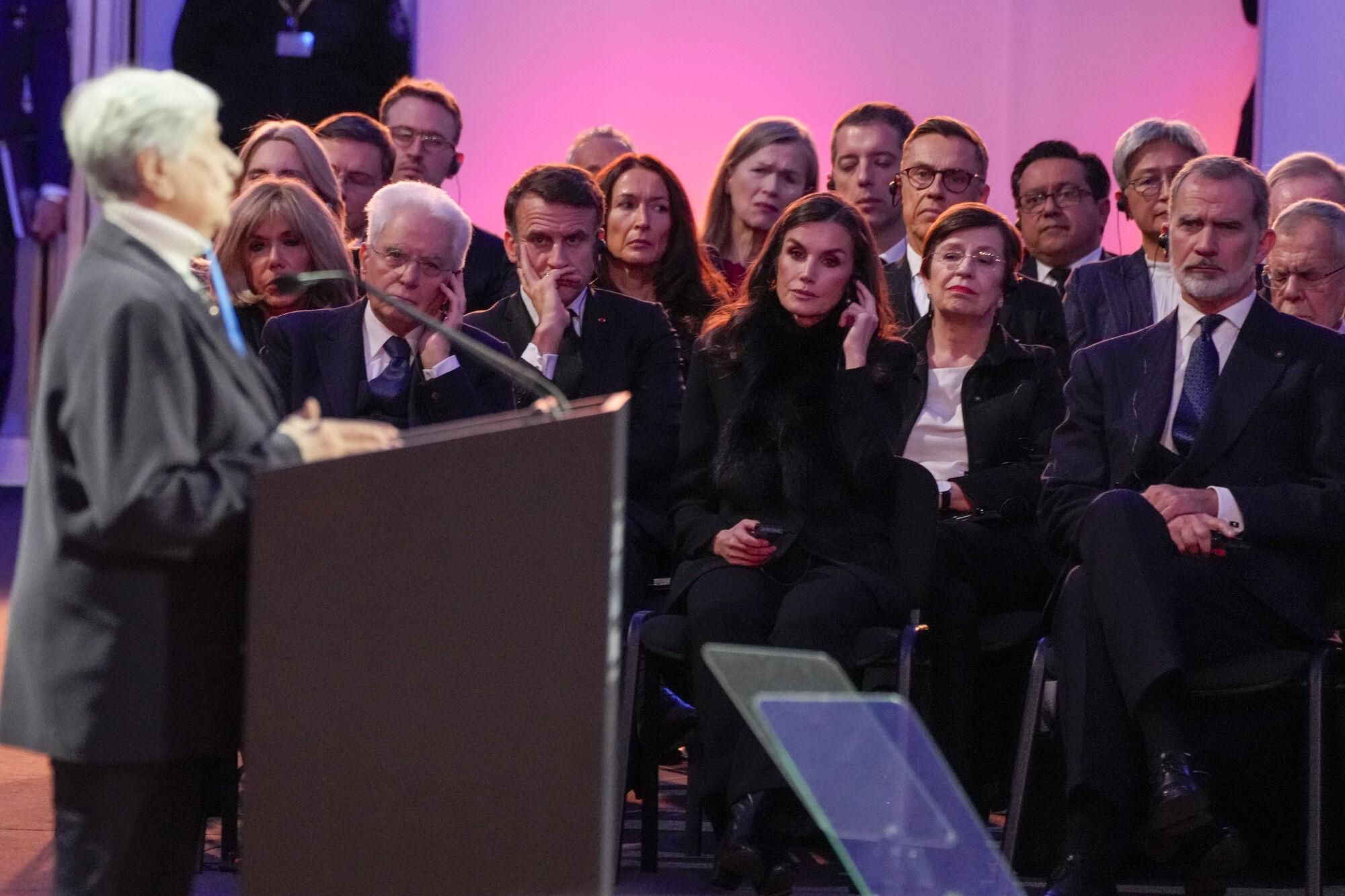 French President Emmanuel Macron, his wife Brigitte, Italian President Sergio Mattarella, Queen Letizia and King Felipe VI of Spain listen to Holocaust survivor Janina Jwanska during a ceremony marking the 80th anniversary of the liberation of the Auschwitz-Birkenau former Nazi German concentration and extermination camp, in Oswiecim, Poland, Monday, Jan. 27. 2025. (AP Photo/Czarek Sokolowski)