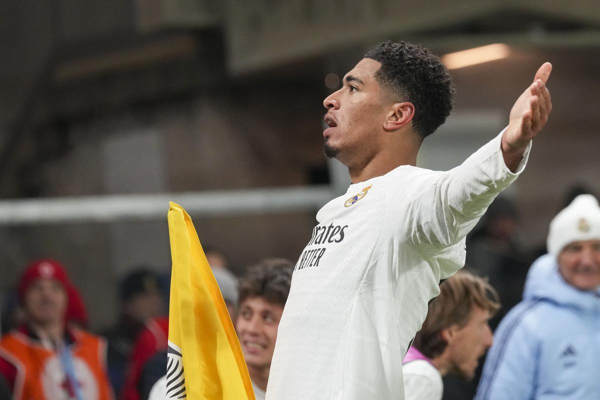 Real Madrid's Jude Bellingham celebrates after he scored his side's third goal during the Champions League opening phase soccer match between Atalanta and Real Madrid at the Bergamo's stadium, in Bergamo, Italy, Tuesday, Dec. 10, 2024. (AP Photo/Antonio Calanni)