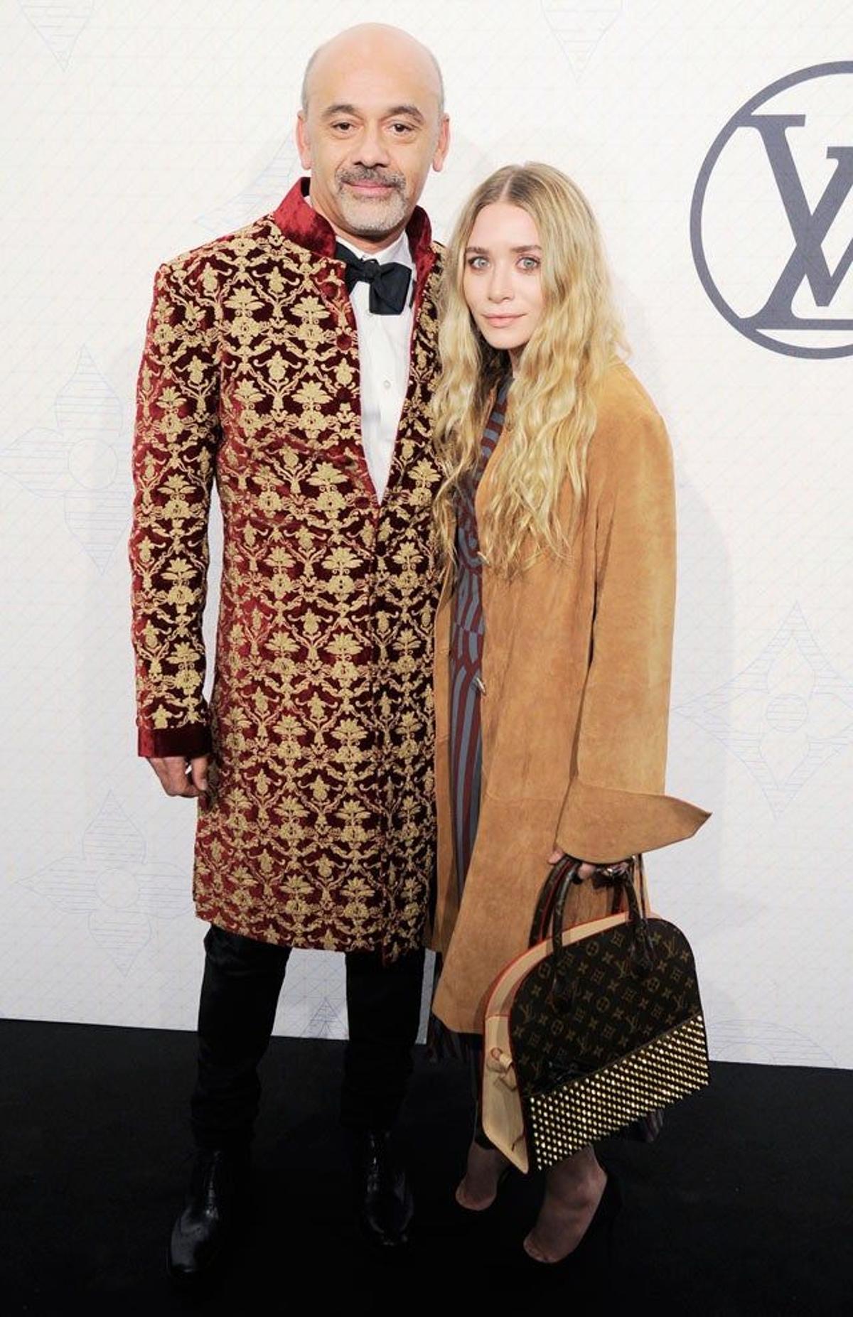 Christian Louboutin y Ashley Olsen, en la fiesta de Louis Vuitton celebrada en el MoMA