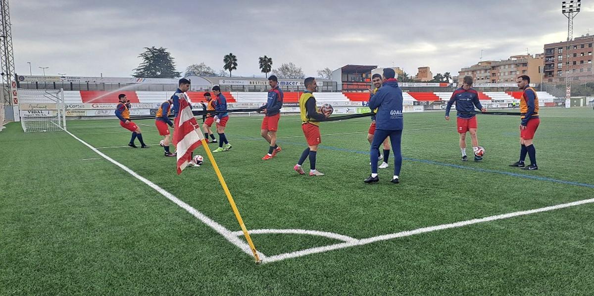 Jugadores "rogets" en el calentamiento previo a un partido