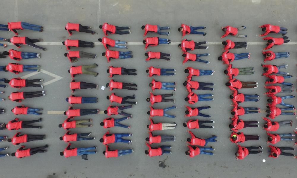 Repartidores asisten a una sesión de entrenamiento en Shanghái, China.