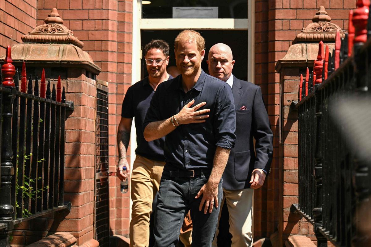Britain's Prince Harry, Duke of Sussex (C), leaves following a visit to Birmingham Children’s Hospital in the city of Birmingham, central England, on July 9, 2026, to celebrate the 20th anniversary of the very first WellChild Nurse. (Photo by Oli SCARFF / AFP)