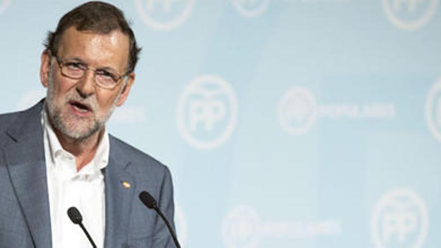 Rajoy promete en Valencia un nuevo modelo de financiación autonómica