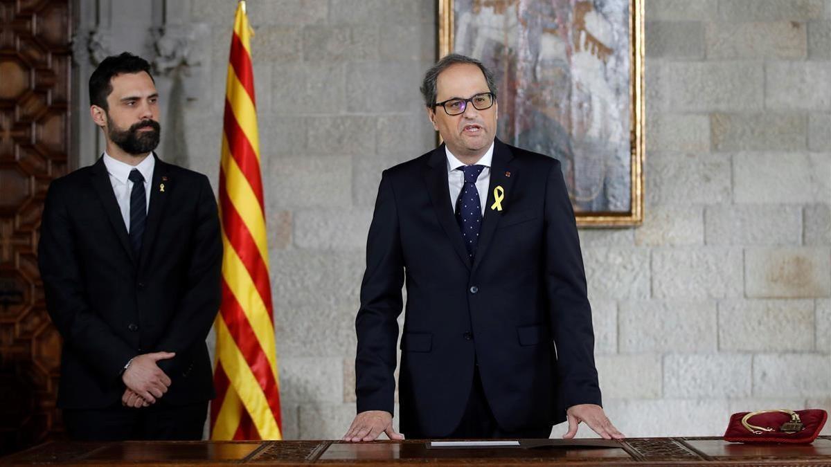 Los presidentes Quim Torra y Roger Torrent durante la toma de posesión.