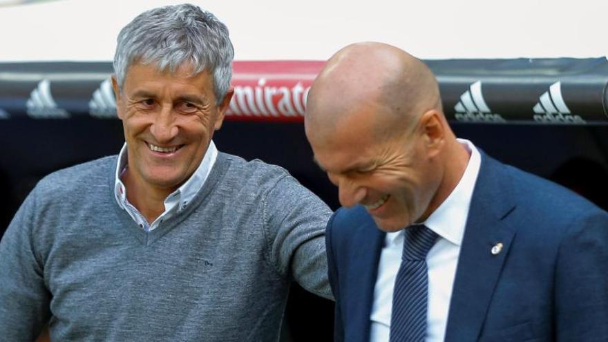 Quique Setién, junto a Zinedine Zidane.