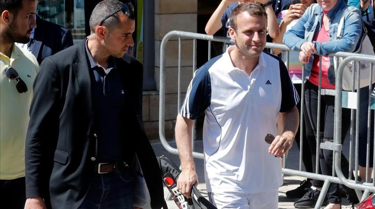 mbenach38925187 french president emmanuel macron carries a racquet as he lea170617164718