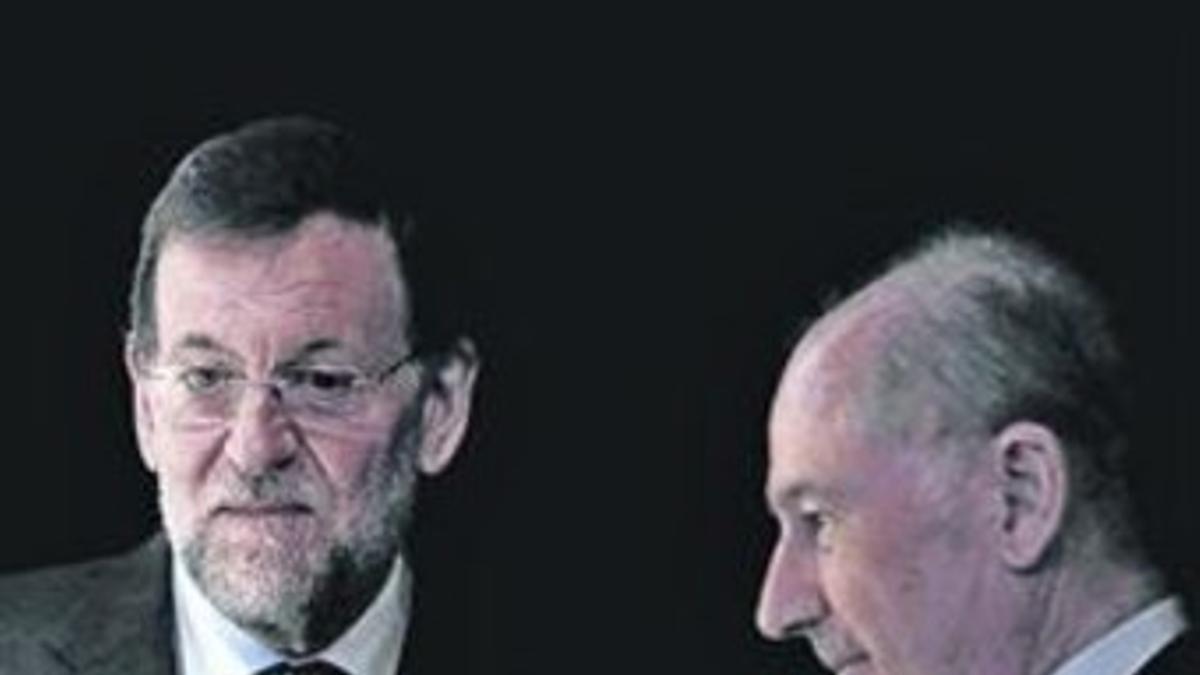 Mariano Rajoy y Rodrigo Rato, en el 2012.