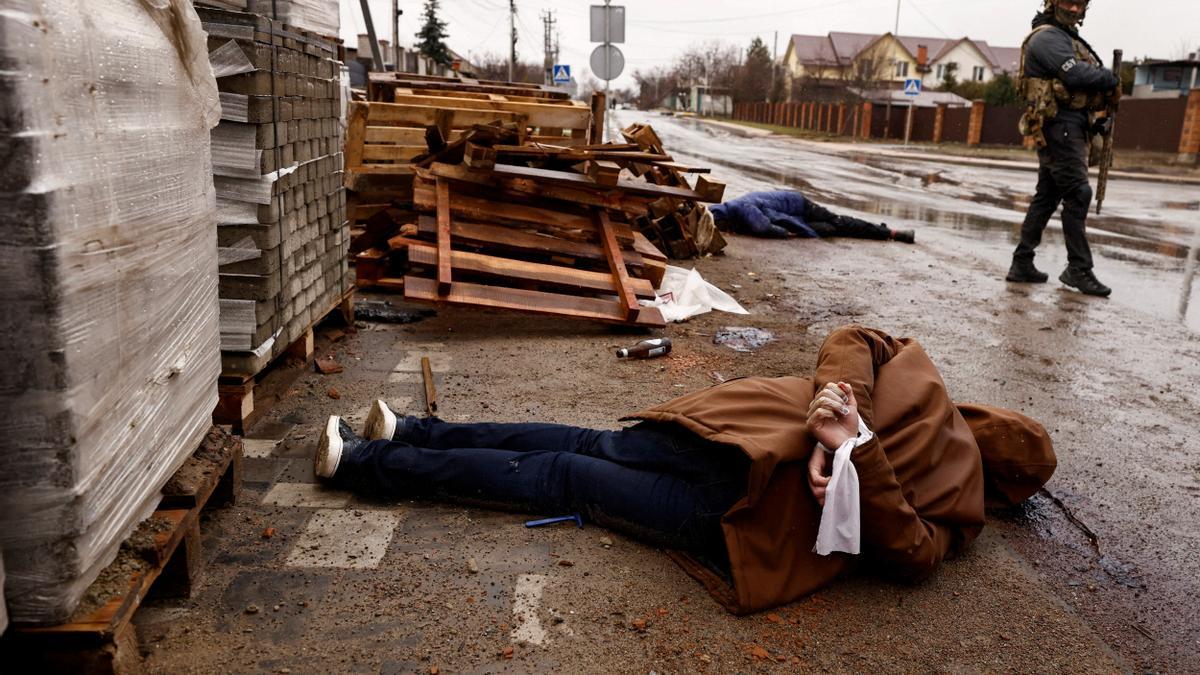 Bodies of civilians lie in the street, amid Russia's invasion on Ukraine, in Bucha