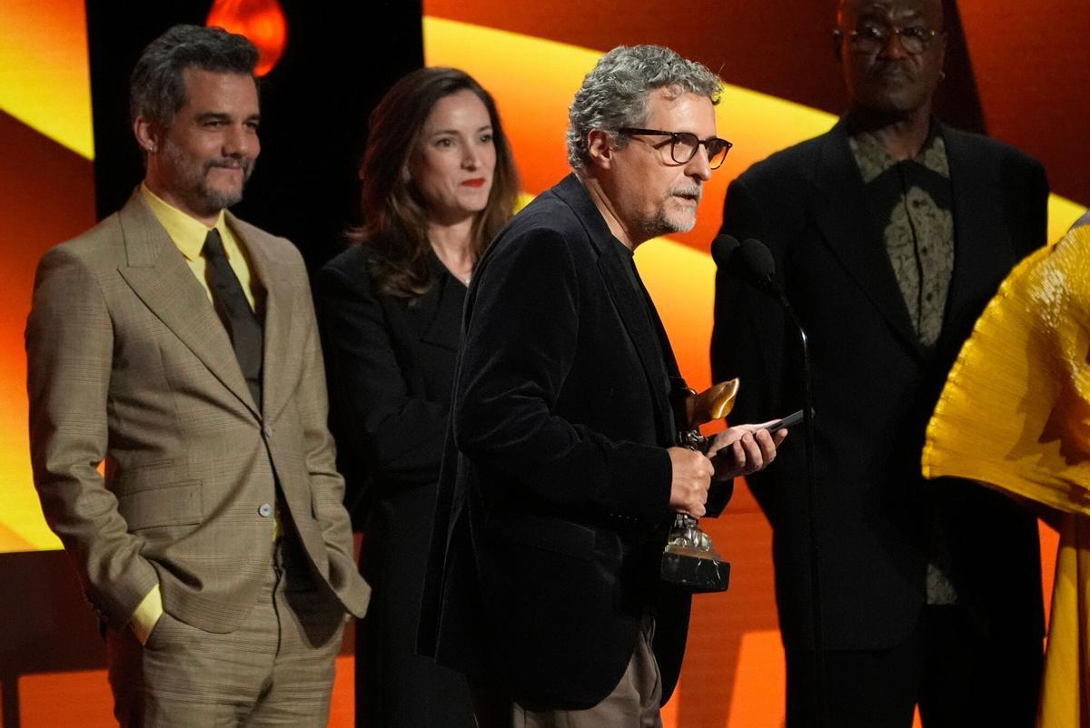 Wagner Moura, from left, Emilie Lesclaux, and Kleber Mendonca Filho accept the award for best international film for "The Secret Agent" during the Film Independent Spirit Awards on Sunday, Feb. 15, 2026, at the Hollywood Palladium in Los Angeles. (AP Photo/Chris Pizzello). 021526132552, 21334631