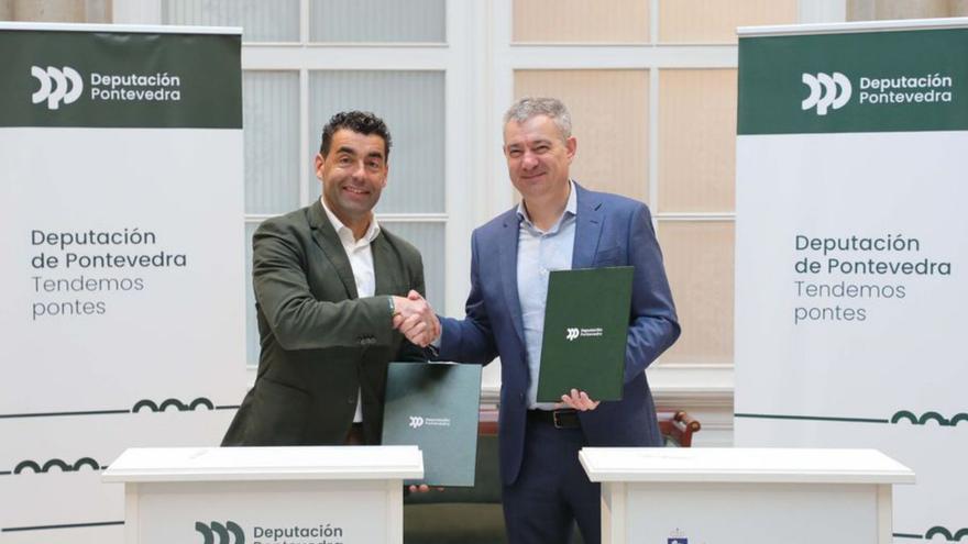 López y Campos, en la firma del convenio en Pontevedra.