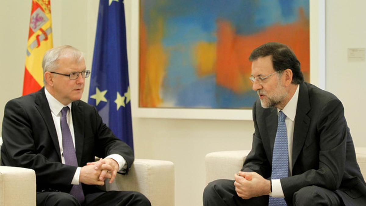 El comisario económico de la Comisión Europea, Olli Rehn, y Mariano Rajoy, el pasado octubre en la Moncloa.