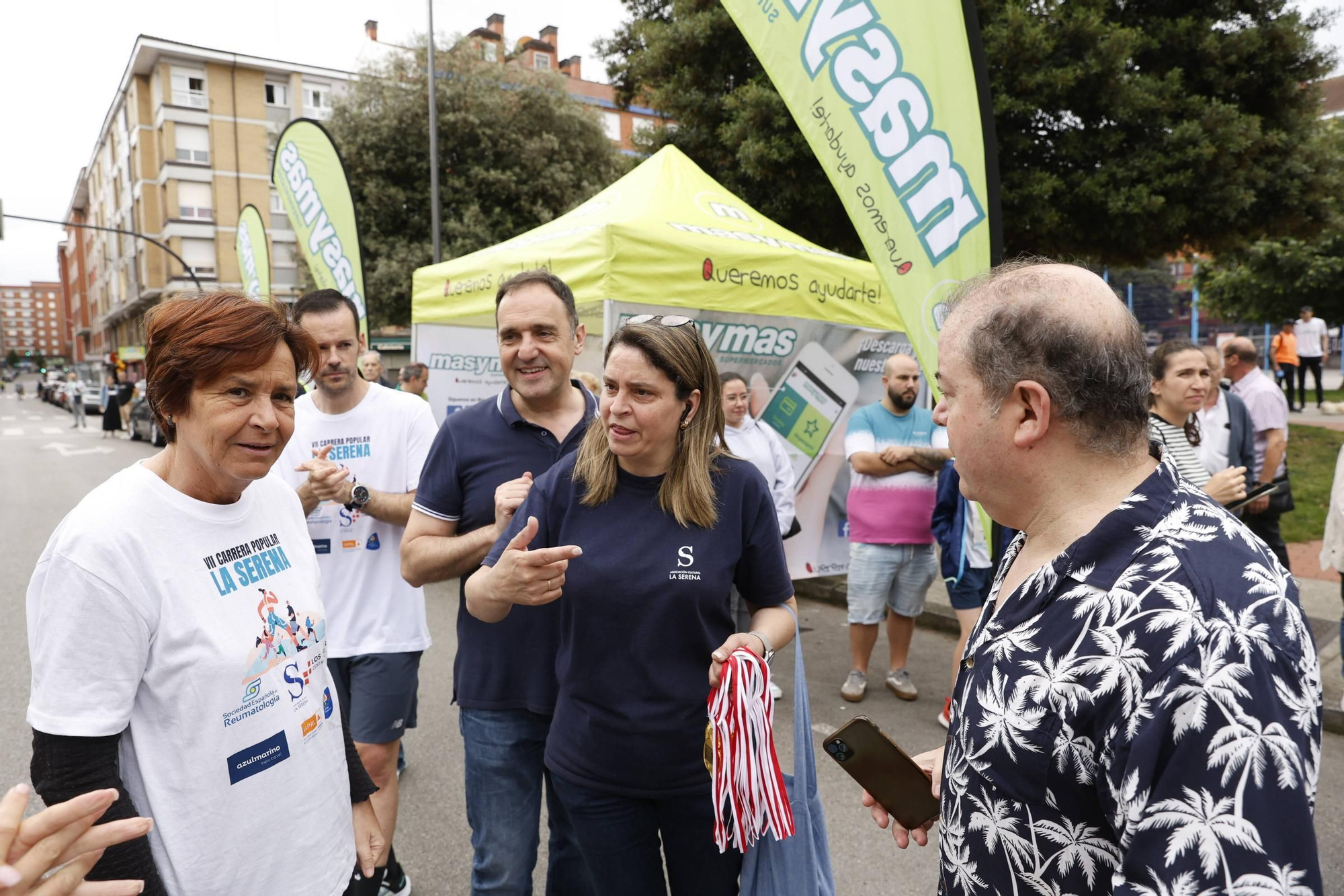 La carrera popular solidaria en El Llano, en Gijón, en imágenes