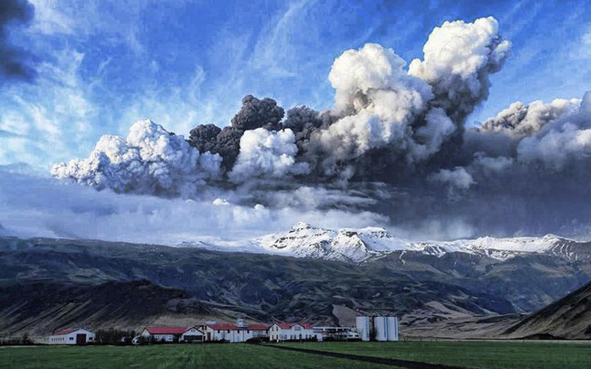 A plume of volcanic ash rises into the atmosphere from a crater under about 656 feet (200 metres) of ice at the Eyjafjallajokull glacier A plume of volcanic ash rises into the atmosphere from a crater under about 656 feet (200 metres) of ice at the Eyjafjallajokull glacier