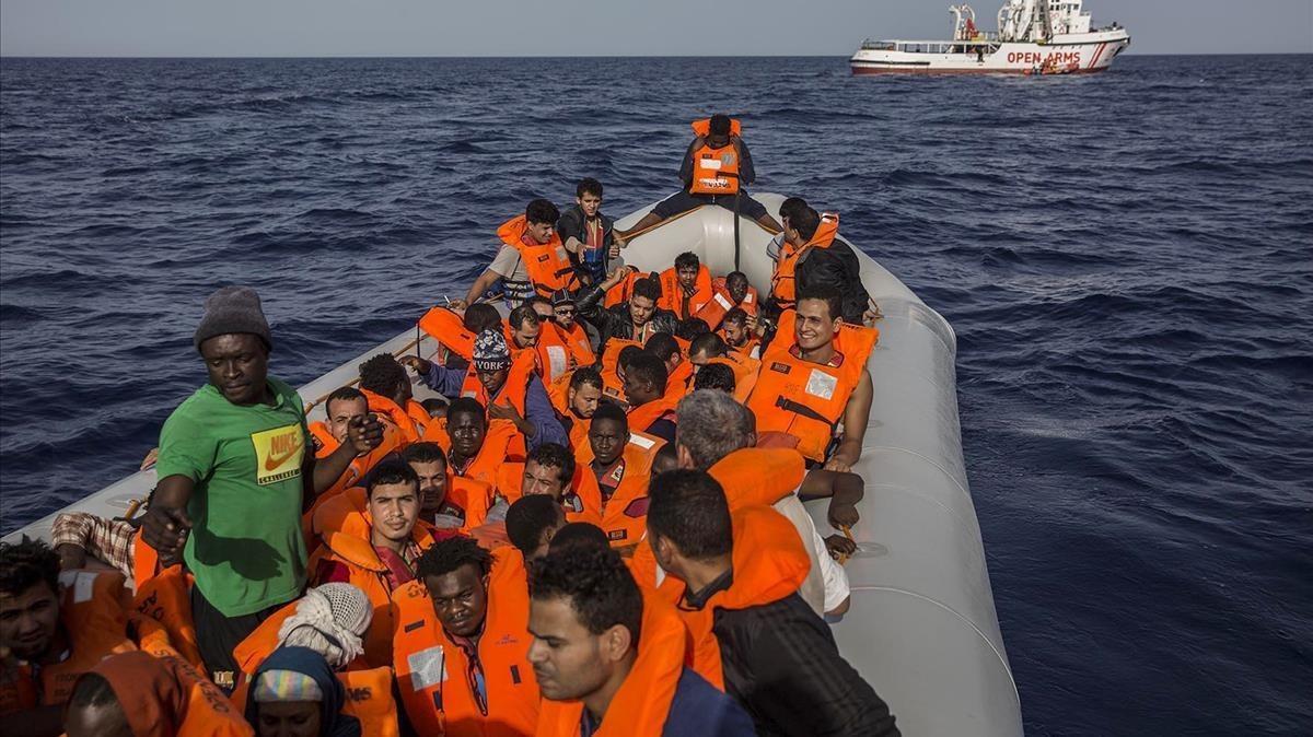 fcasals44063422 migrants aboard a rubber dinghy off the libyan coast are pro180630152945