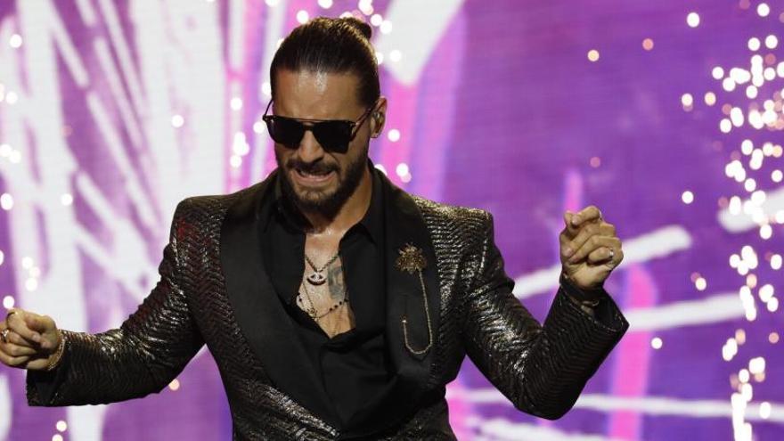 Maluma durante un concierto.