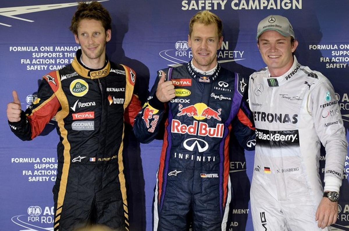 Vettel celebra la ’pole position’ amb Grosjean i Rosberg. Vettel celebra la ’pole position’ amb Grosjean i Rosberg.