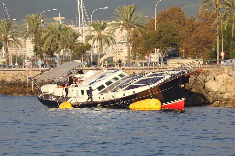 Empiezan los trabajos para reflotar el velero encallado en Can Pere Antoni