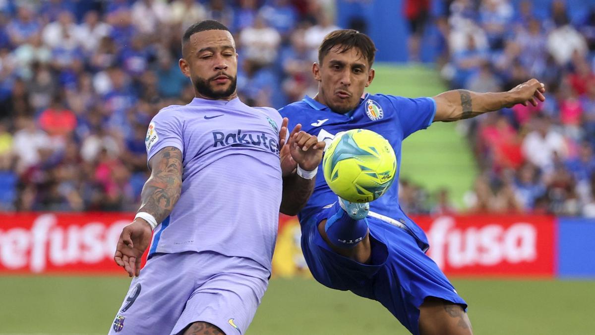 Memphis pelea la pelota con Damián