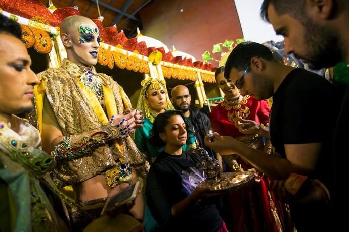 Participant prepares to perform in a drag queen ...