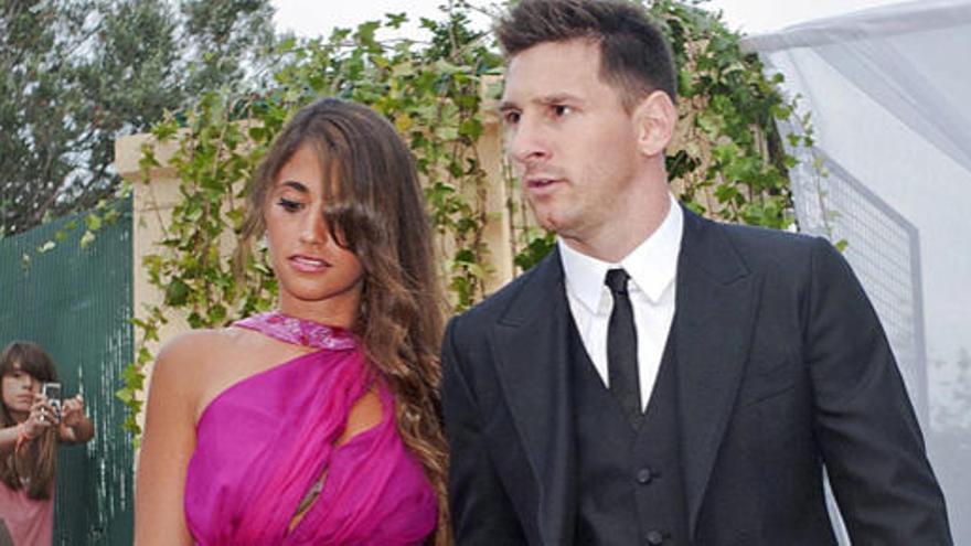 Messi, con su pareja, este verano.