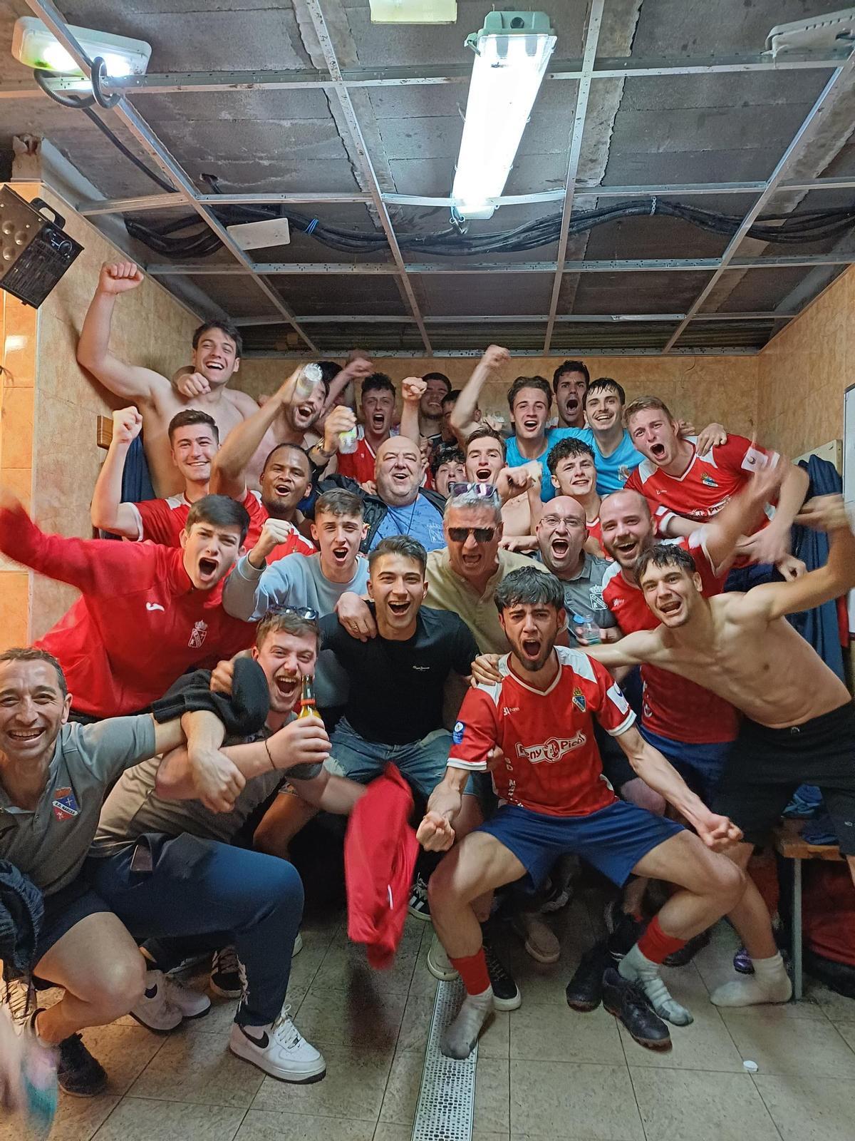 Celebración del equipo en el vestuario.